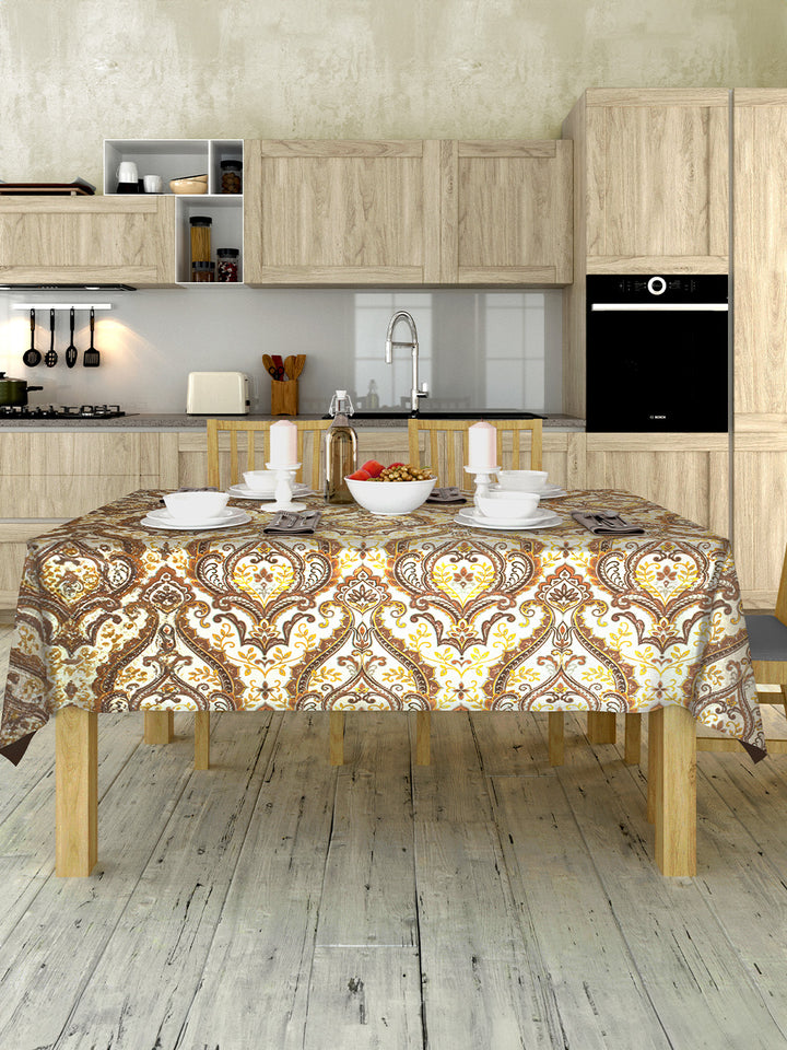 Kitchen with wooden table and decorative tablecloth