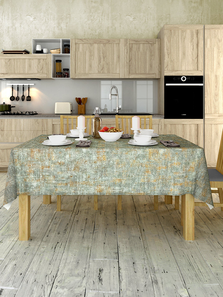 Modern kitchen with wooden cabinets, a dining table, and kitchen appliances.