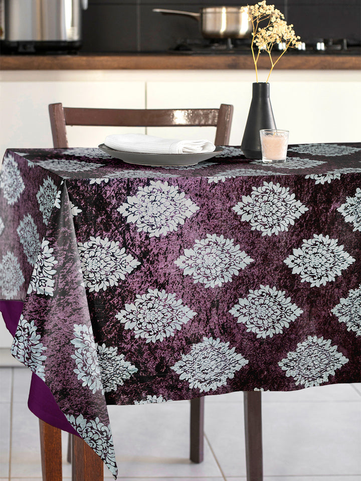Tablecloth with floral pattern on a dining table in a kitchen setting